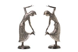 A PAIR OF INDIAN SILVER FIGURES OF DANCERS