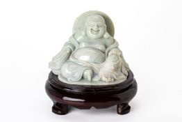 A CARVED JADE FIGURE OF BUDAI