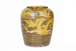 A LARGE BROWN GLAZED DRAGON JAR