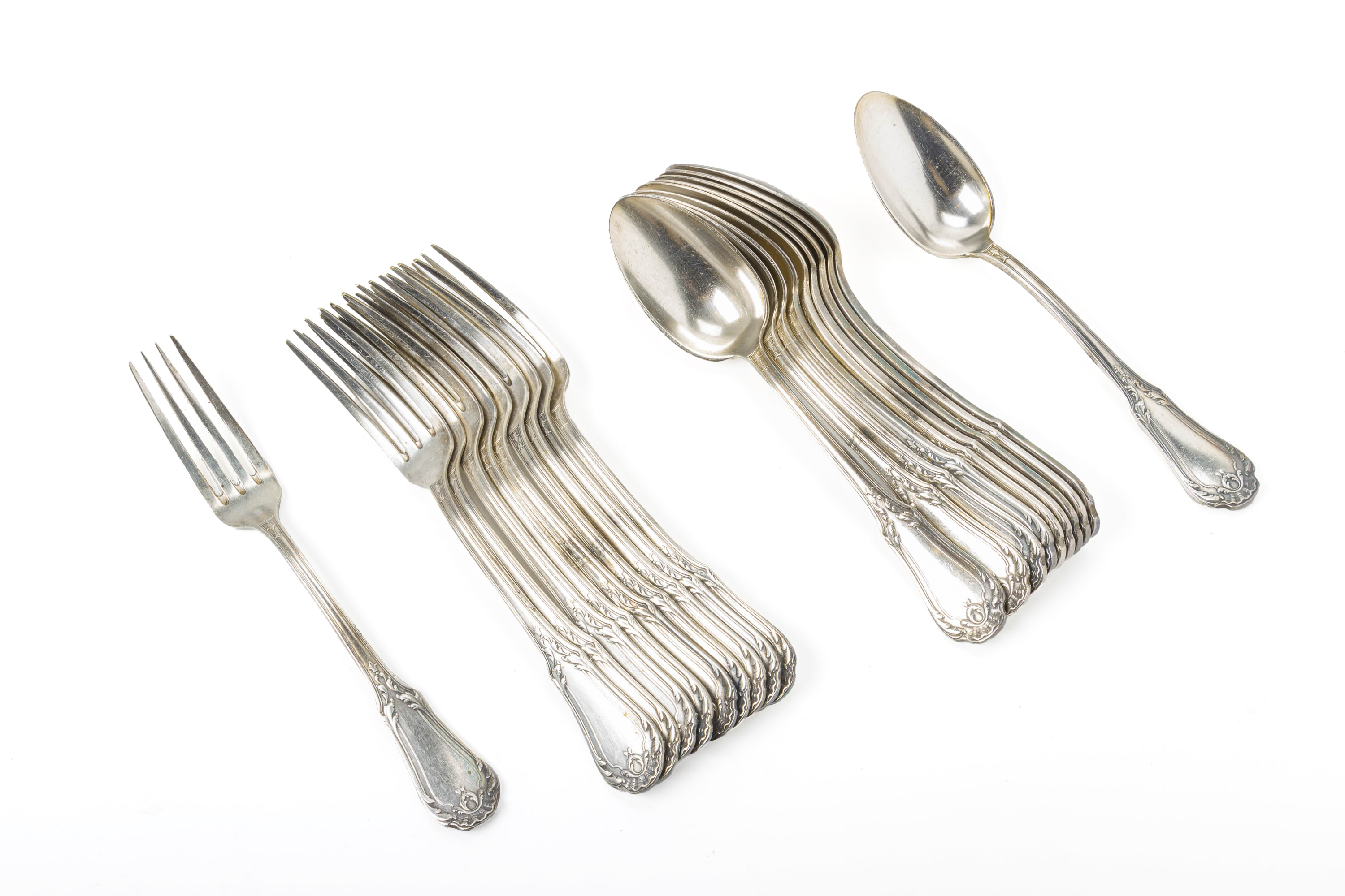A SET OF FRENCH SILVER PLATED TABLE FORKS AND SPOONS