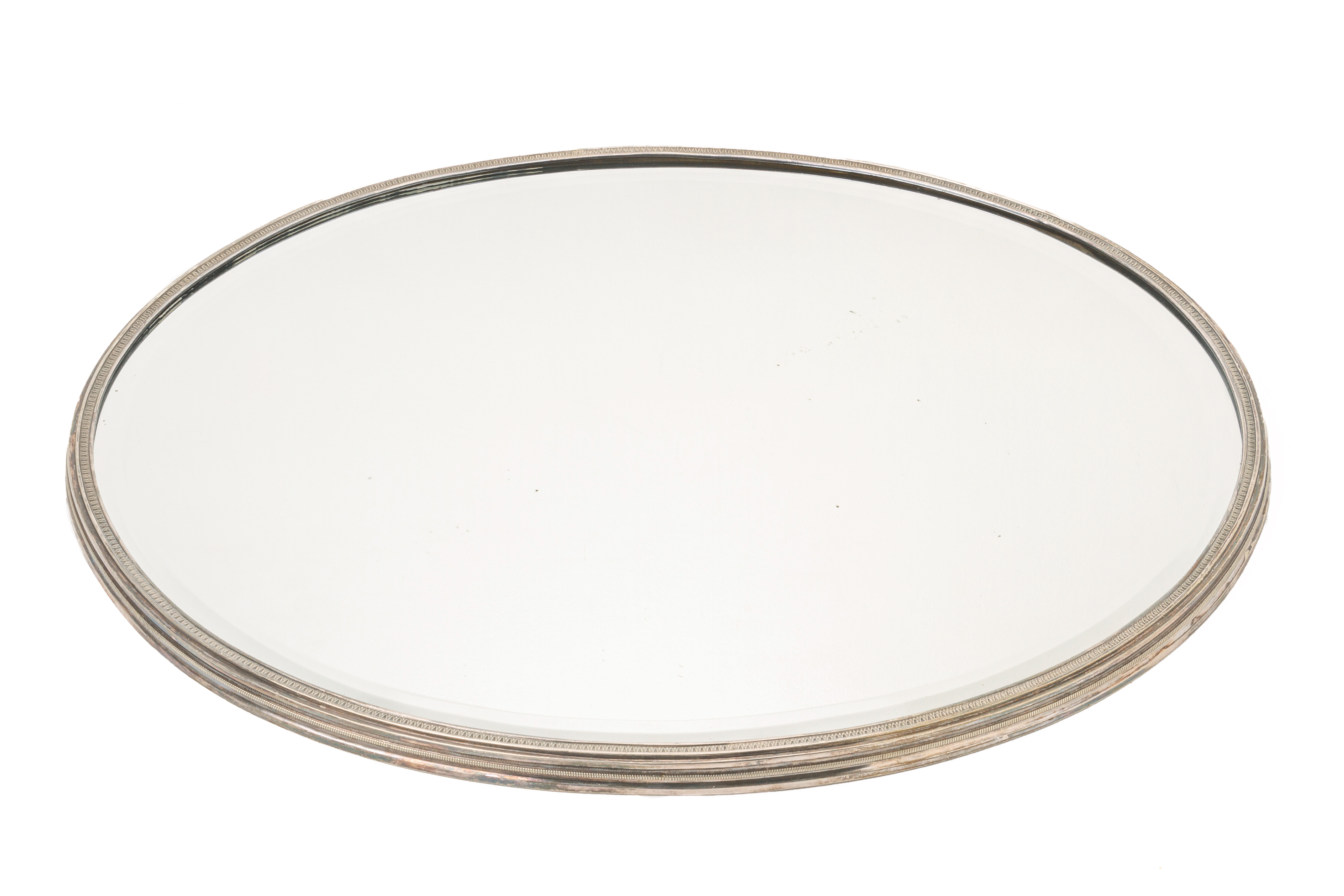 A SILVER PLATED OVAL MIRROR PLATEAU