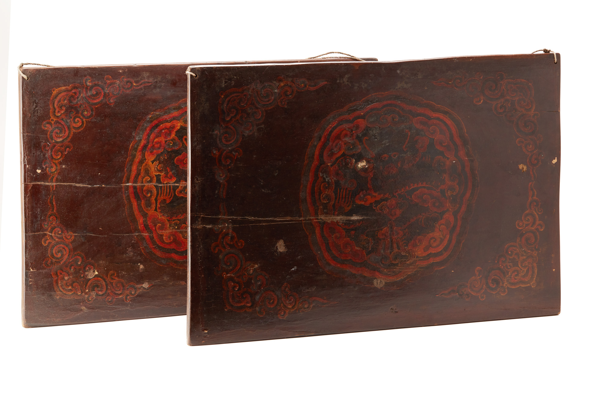 A PAIR OF DRAGON DECORATED WOOD PANELS