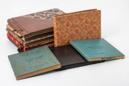 A GROUP OF WWII RAF FLYING LOG BOOKS AND PHOTOGRAPH ALBUMS