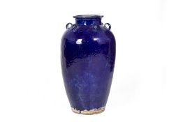 A LARGE BLUE GLAZED MARTABAN JAR