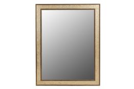 A LARGE FRAMED WALL MIRROR