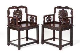 A PAIR OF CHINESE CARVED HARDWOOD ARMCHAIRS