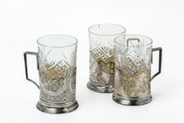 A GROUP OF THREE RUSSIAN SOVIET SILVER TEA GLASS HOLDERS