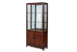 A ROSEWOOD GLAZED DISPLAY CABINET