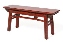 A CHINESE RED LACQUER AND PARCEL GILT RECTANGULAR STOOL