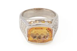 A IMPERIAL TOPAZ AND DIAMOND RING