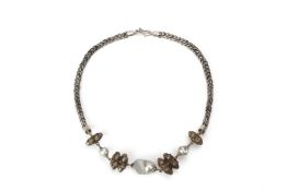 A CULTURED SOUTH SEA PEARL WHITE METAL NECKLACE