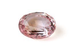 A LOOSE 1.55 CARAT PADPARADSCHA SAPPHIRE