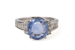 AN UNHEATED SAPPHIRE AND DIAMOND RING