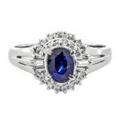 A SAPPHIRE AND DIAMOND RING