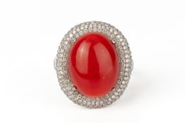 A RED CORAL AND DIAMOND RING