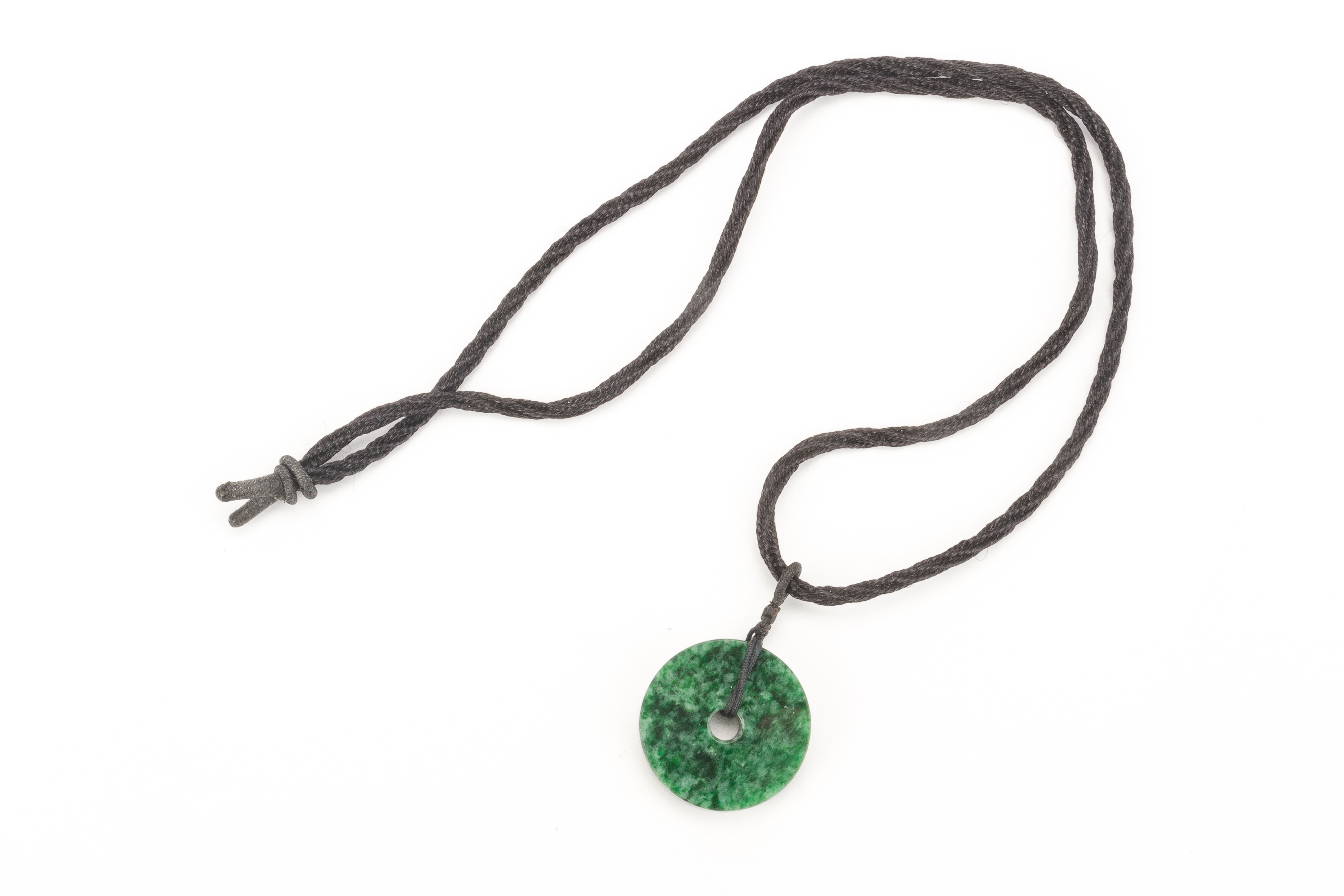 A TYPE A JADEITE DISC FORM PENDANT ON CORD - Image 2 of 3
