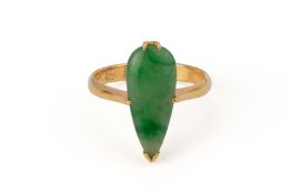 A JADE AND GOLD RING