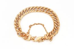 A BEVELED CURB LINK GOLD BRACELET