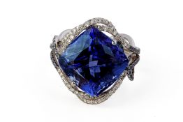 A LARGE TANZANITE AND DIAMOND RING