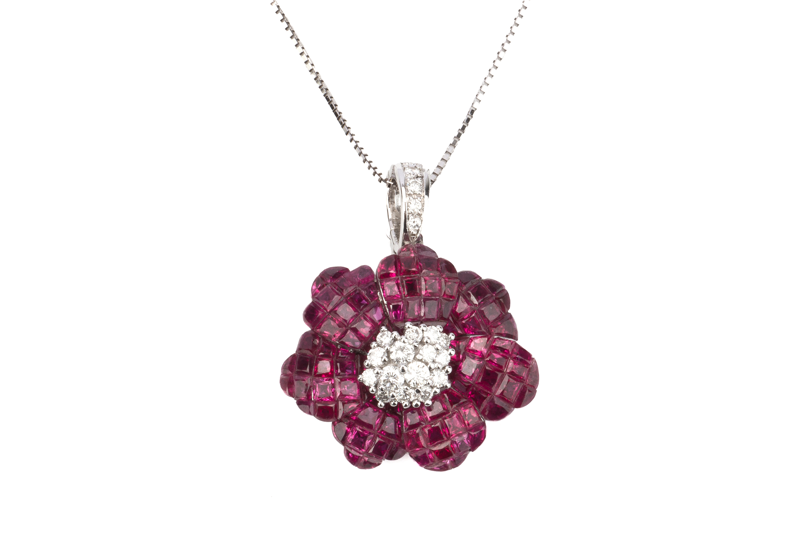 A RUBY AND DIAMOND PENDANT ON CHAIN