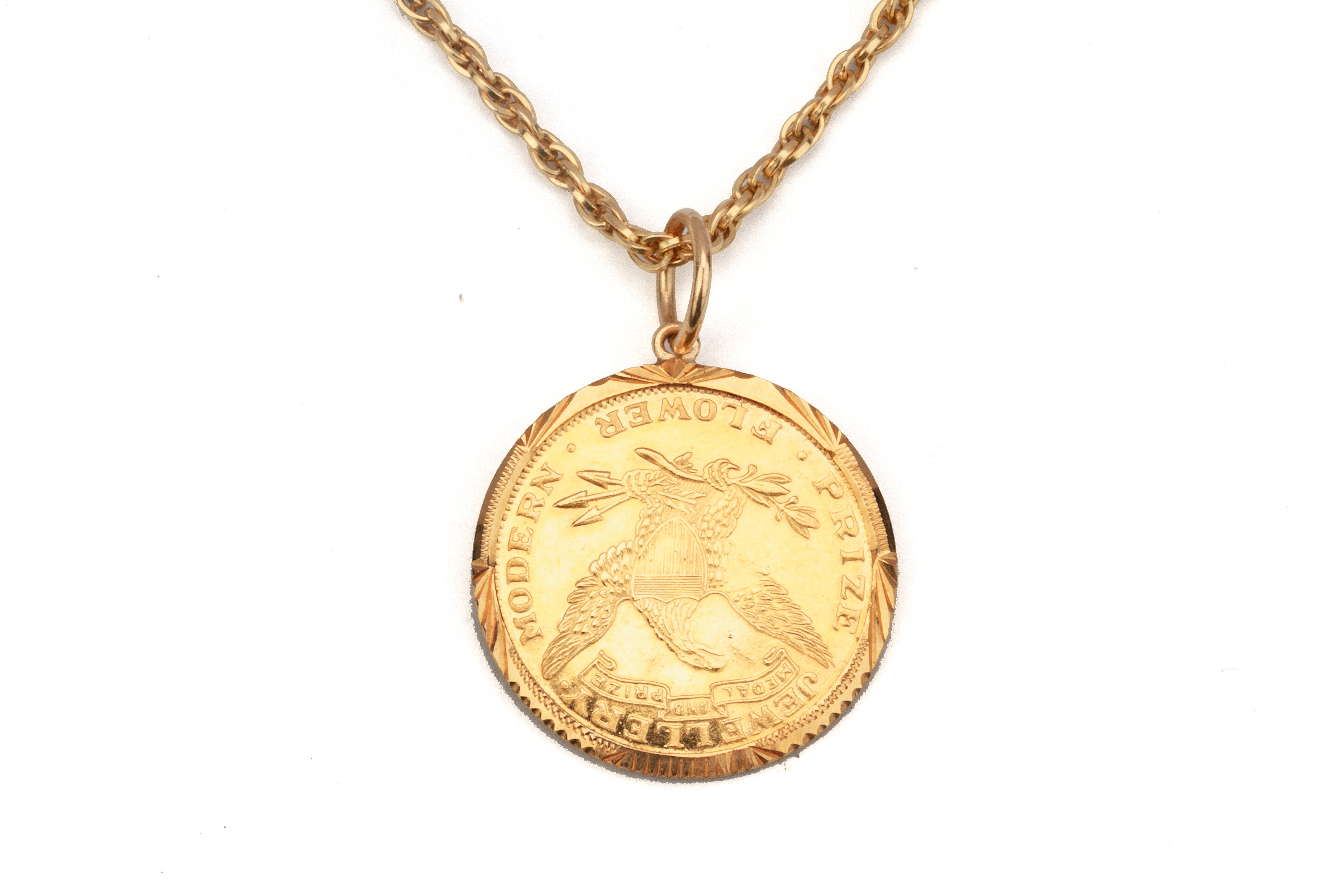 A GOLD MEDALLION PENDANT ON CHAIN - Image 2 of 2