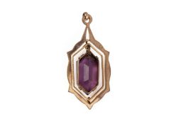 A DIAMOND THREE STONE RING AND AN AMETHYST PENDANT