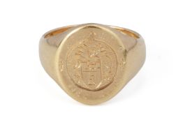 AN ENGRAVED GOLD SIGNET RING