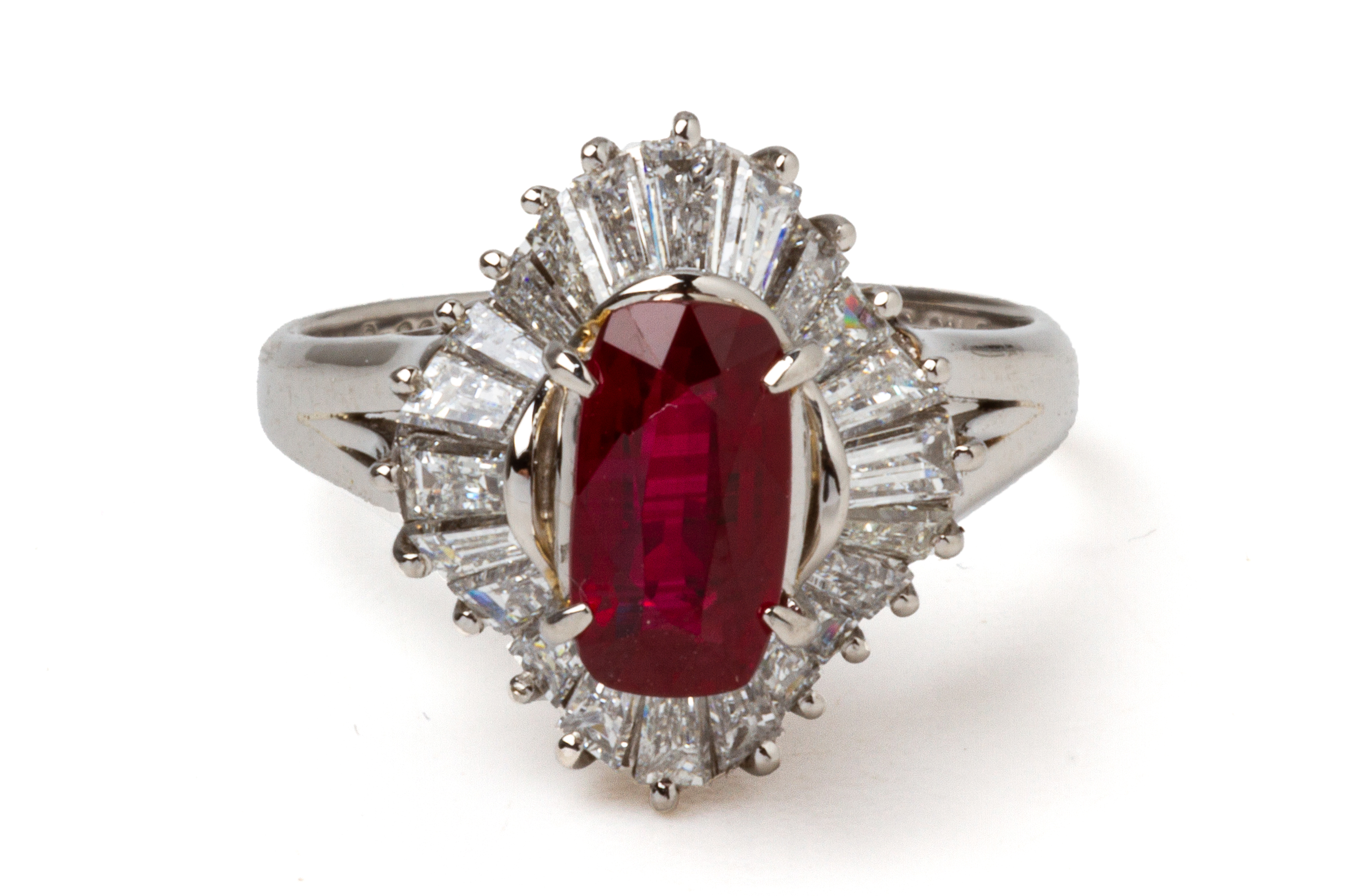 AN UNHEATED RUBY AND DIAMOND RING