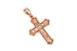 A DIAMOND AND GOLD CROSS PENDANT