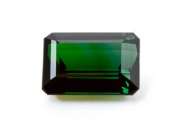 A LOOSE 31.39 CARAT EMERALD CUT GREEN TOURMALINE