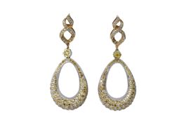 A PAIR OF TWO TONED GOLD AND DIAMOND EARRINGS