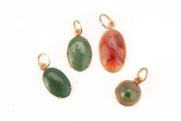 A GROUP OF FOUR MULTI GEM SET PENDANTS