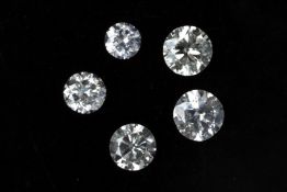 A GROUP OF FIVE LOOSE ROUND DIAMONDS