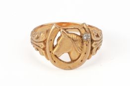 A GOLD AND DIAMOND EQUESTRiAN THEMED RING