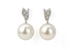 A PAIR OF CULTURED PEARL AND DIAMOND DROP EARRINGS