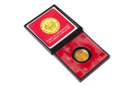 A SINGAPORE $100 1975 10TH ANNIVERSARY GOLD COIN