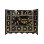 A BLACK LACQUER AND HARDSTONE INSET SIX FOLD SCREEN