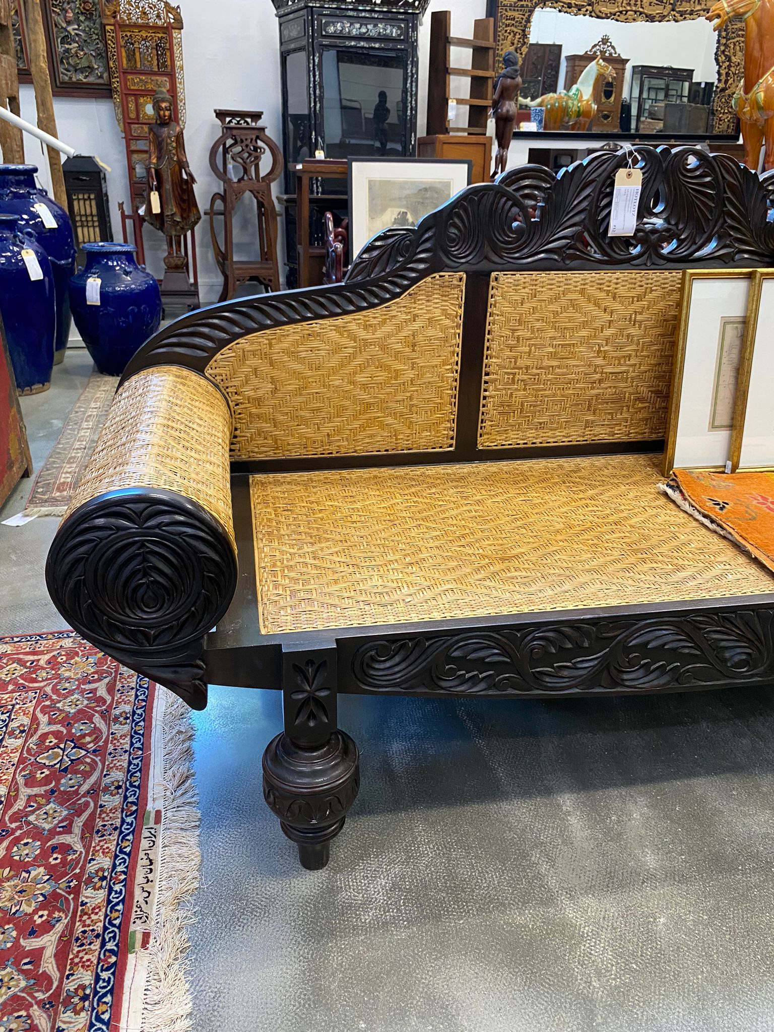 AN ANGLO INDIAN CARVED TEAK SOFA - Image 12 of 12