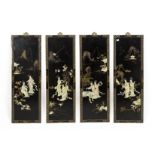 A SET OF FOUR LACQUER WALL PANELS