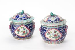 A PAIR OF POLYCHROME ENAMELLED COVERED BOWLS