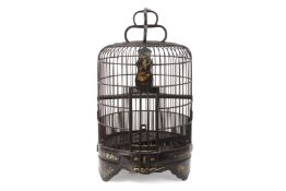 A BLACK LACQUER AND MOTHER OF PEARL INLAID BIRDCAGE