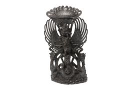 A INDONESIAN CARVED HARDWOOD FIGURE OF GARUDA