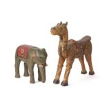 A CARVED WOOD ELEPHANT AND CAMEL