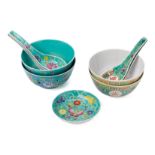 A GROUP OF TURQUOISE GROUND FAMILLE ROSE BOWLS AND SPOONS