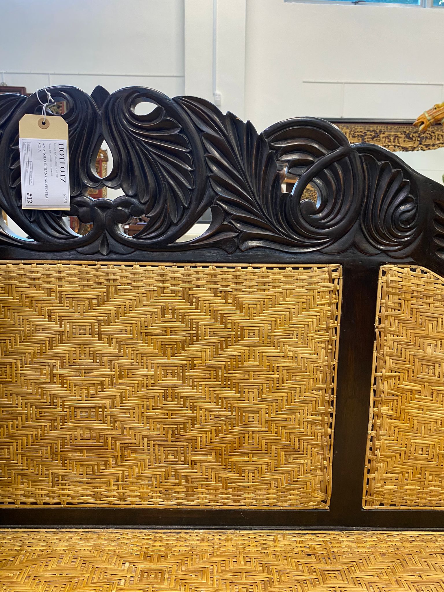 AN ANGLO INDIAN CARVED TEAK SOFA - Image 11 of 12