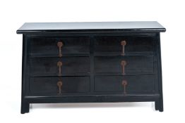 A BLACK LACQUER CHEST OF DRAWERS