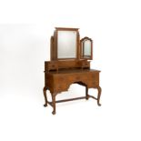 A VINTAGE TEAK DRESSING TABLE