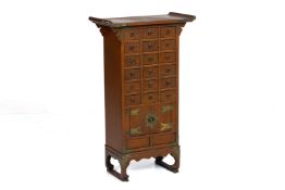 A SMALL ORIENTAL APOTHECARY TYPE CABINET