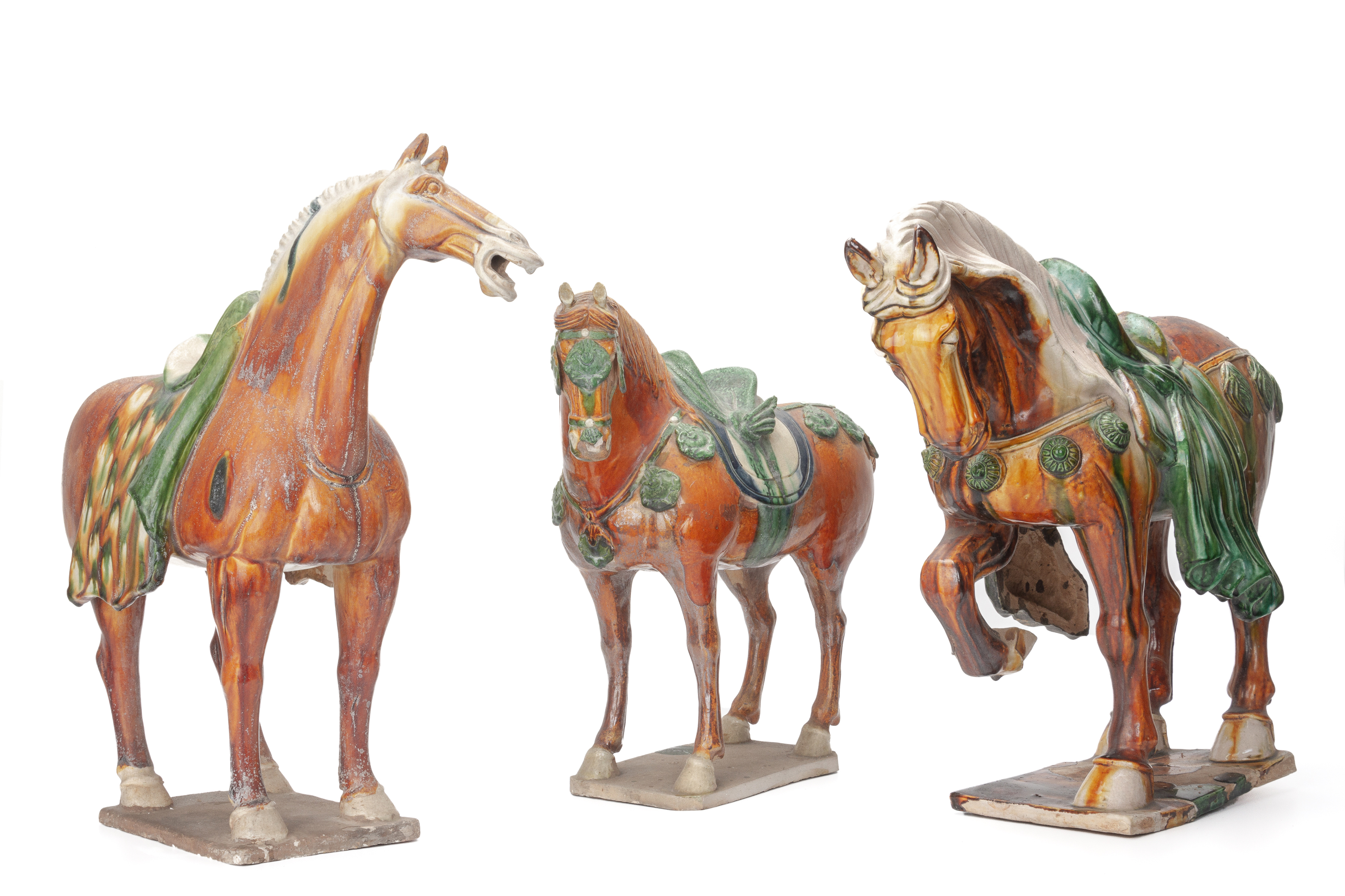 A GROUP OF THREE SANCAI GLAZED MODELS OF HORSES