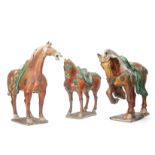 A GROUP OF THREE SANCAI GLAZED MODELS OF HORSES